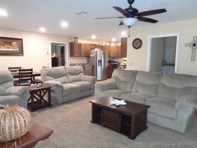 419124 E 1144th Rd, Checotah, OK 74426 - living area featuring light carpet, recessed lighting, and ceiling fan