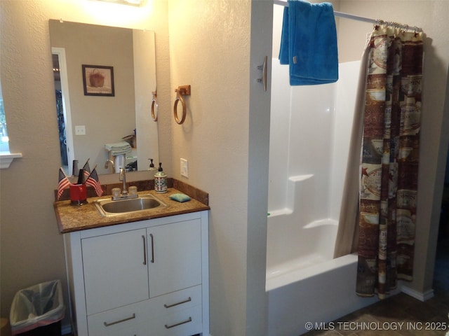 419124 E 1144th Rd, Checotah, OK 74426 - full bath featuring vanity, shower / bath combo with shower curtain, and a textured wall