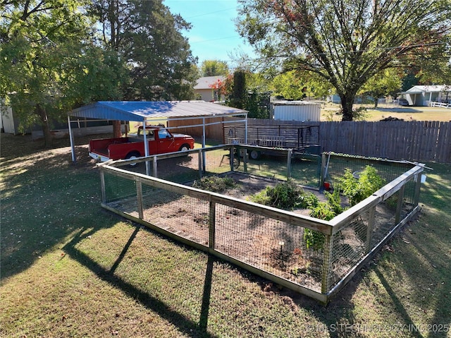 419124 E 1144th Rd, Checotah, OK 74426 - view of yard with a detached carport and a vegetable garden