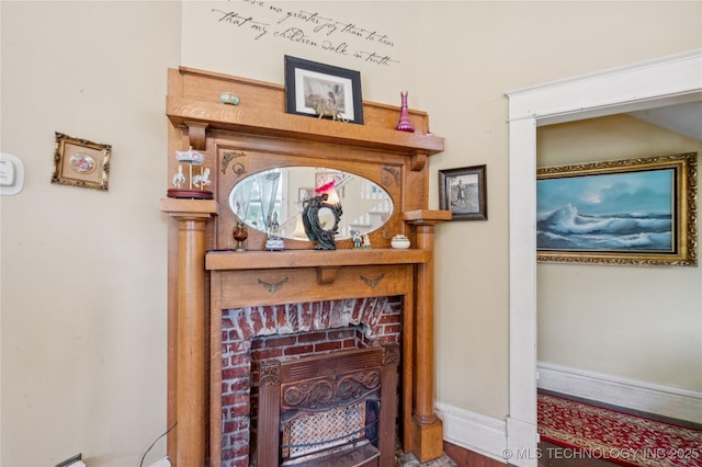 415 S 13th St, Muskogee, OK 74401 - detailed view of a fireplace and baseboards