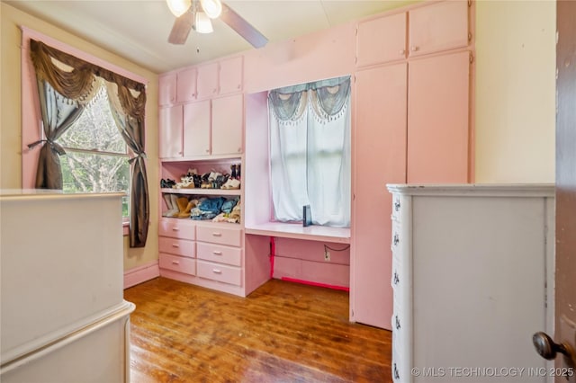 415 S 13th St, Muskogee, OK 74401 - bedroom featuring wood finished floors and a ceiling fan