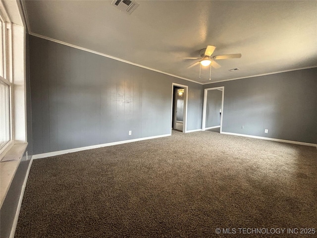 305 NW 4th St Unit 1/2, Wilburton, OK 74578 - carpeted empty room featuring ceiling fan and ornamental molding