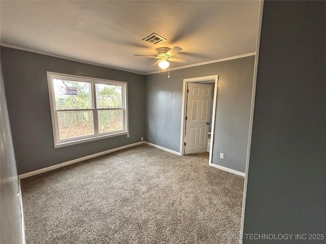 305 NW 4th St Unit 1/2, Wilburton, OK 74578 - unfurnished room featuring ornamental molding, ceiling fan, and carpet flooring