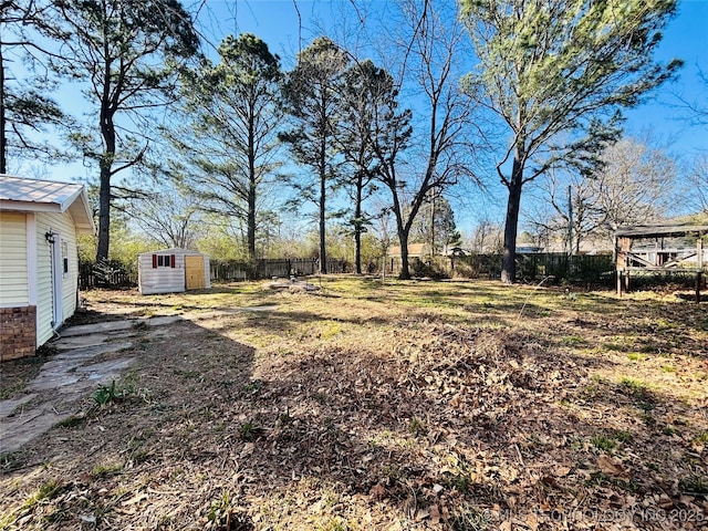 305 NW 4th St Unit 1/2, Wilburton, OK 74578 - fenced backyard with a shed