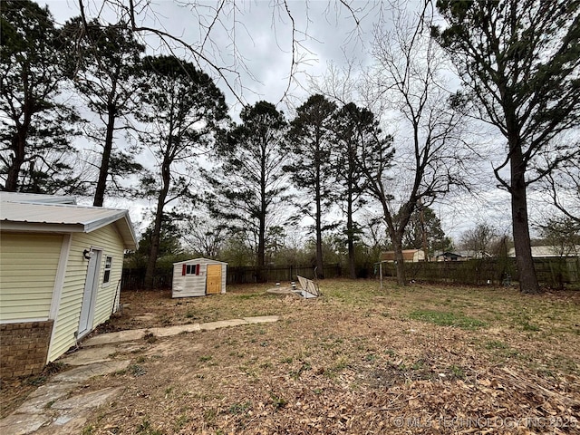 305 NW 4th St Unit 1/2, Wilburton, OK 74578 - view of yard featuring a storage shed