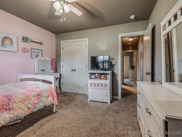 7616 E 84th St, Owasso, OK 74021 - bedroom with dark carpet, a closet, and ceiling fan