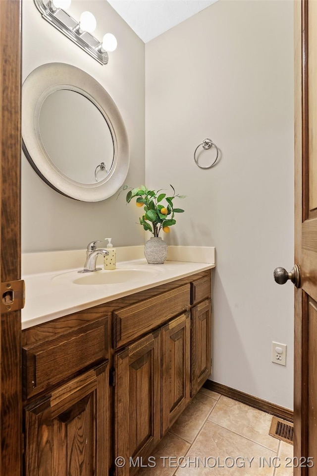 9644 Ew 19 Rd, Nowata, OK 74048 - bathroom featuring vanity and tile patterned flooring