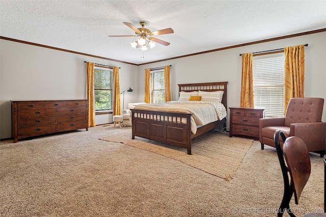 9644 Ew 19 Rd, Nowata, OK 74048 - bedroom featuring carpet flooring, crown molding, a textured ceiling, and a ceiling fan