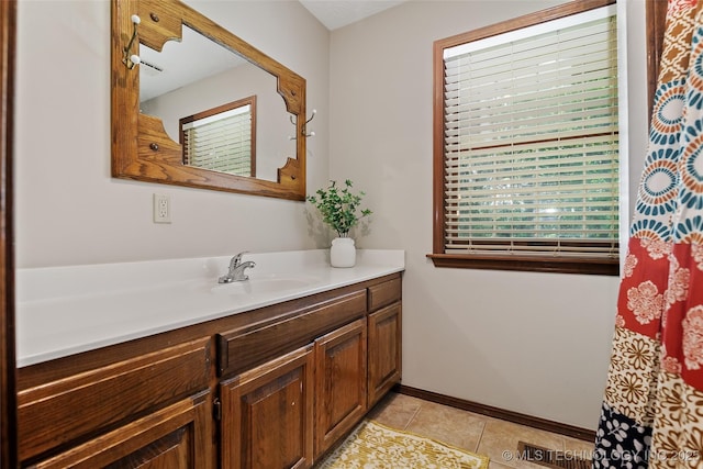 9644 Ew 19 Rd, Nowata, OK 74048 - bathroom with vanity and tile patterned floors