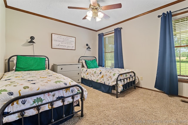 9644 Ew 19 Rd, Nowata, OK 74048 - carpeted bedroom featuring ceiling fan, ornamental molding, and a textured ceiling