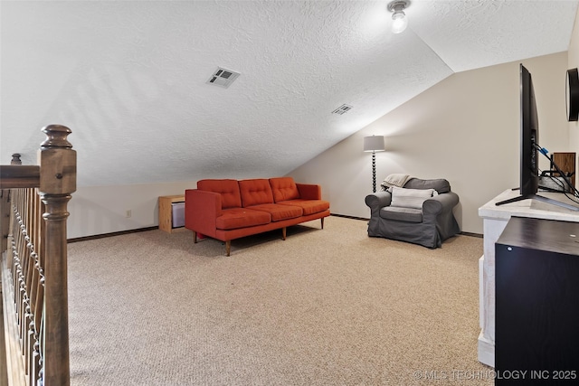9644 Ew 19 Rd, Nowata, OK 74048 - carpeted living room with a textured ceiling and vaulted ceiling