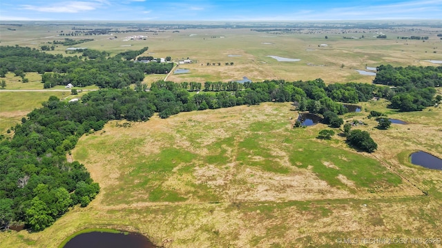 9644 Ew 19 Rd, Nowata, OK 74048 - aerial overview of property's location featuring a nearby body of water and rural landscape