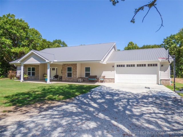 414467 E 1090th Rd, Checotah, OK 74426 - single story home featuring driveway, a garage, a front lawn, brick siding, and a metal roof