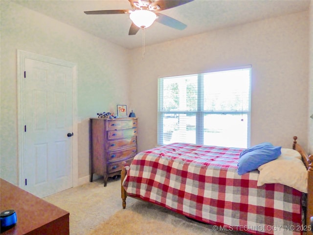 414467 E 1090th Rd, Checotah, OK 74426 - bedroom featuring light carpet and ceiling fan