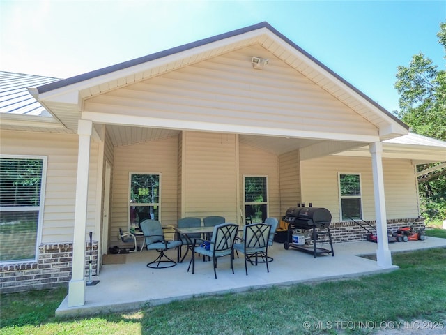414467 E 1090th Rd, Checotah, OK 74426 - rear view of property with a patio