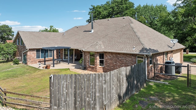 12920 E 183rd St S, Bixby, OK 74008 - rear view of property with brick siding, a pergola, and a fenced backyard