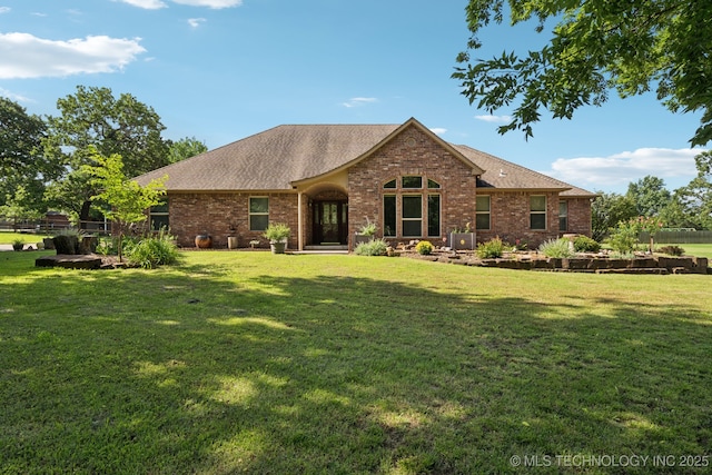 12920 E 183rd St S, Bixby, OK 74008 - ranch-style home with brick siding, a shingled roof, and a front lawn