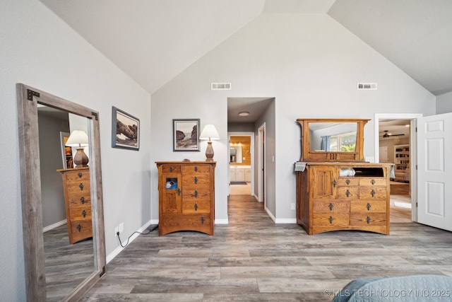 12920 E 183rd St S, Bixby, OK 74008 - bedroom featuring high vaulted ceiling and wood finished floors
