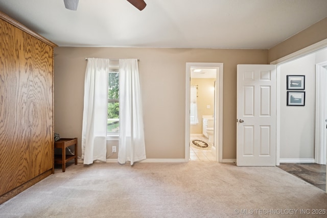 12920 E 183rd St S, Bixby, OK 74008 - unfurnished bedroom featuring carpet floors, connected bathroom, and a ceiling fan