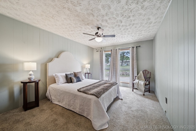 18005 S 4185th Rd, Claremore, OK 74017 - carpeted bedroom featuring a textured ceiling and ceiling fan