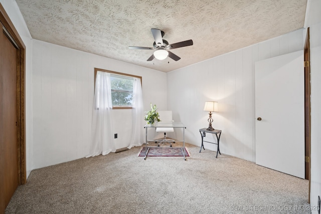 18005 S 4185th Rd, Claremore, OK 74017 - living area featuring a ceiling fan, carpet floors, and a textured ceiling