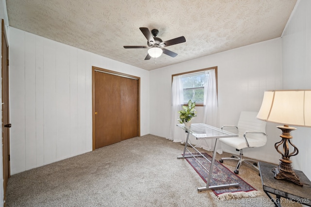 18005 S 4185th Rd, Claremore, OK 74017 - living area featuring a textured ceiling, ceiling fan, and carpet flooring
