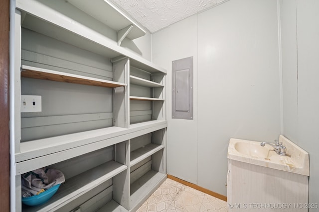 18005 S 4185th Rd, Claremore, OK 74017 - storage room featuring electric panel and a sink
