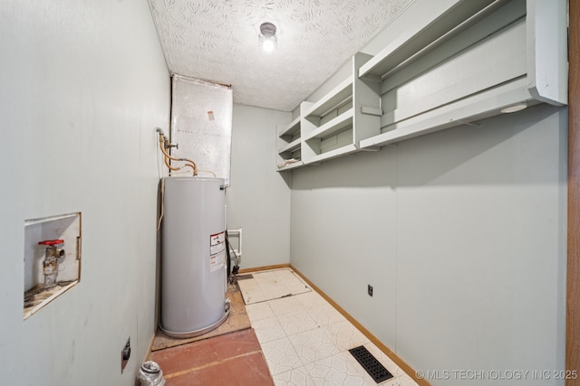 18005 S 4185th Rd, Claremore, OK 74017 - utility room featuring water heater