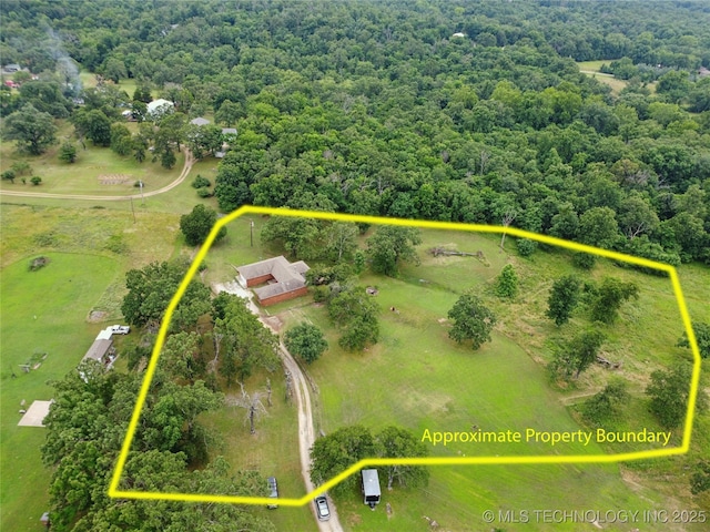 18005 S 4185th Rd, Claremore, OK 74017 - aerial view of property and surrounding area with property parcel outlined and a heavily wooded area