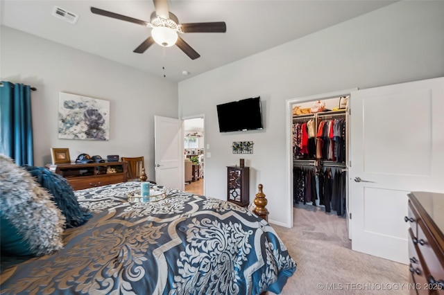2402 W Kingsport Ct S, Broken Arrow, OK 74011 - bedroom with light colored carpet, a walk in closet, a closet, and ceiling fan