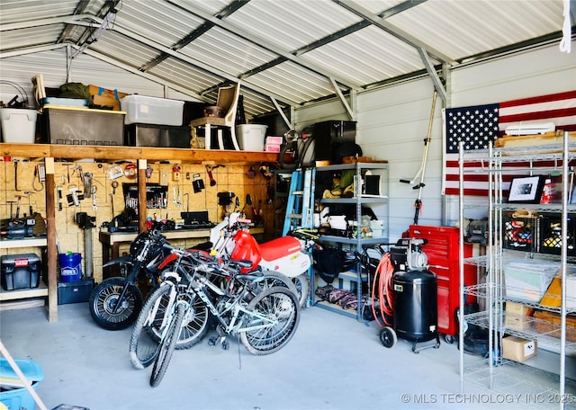 330 Kiamichi, Eufaula, OK 74432 - garage featuring a workshop area