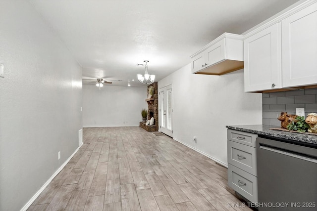 30078 E 143rd St S, Coweta, OK 74429 - kitchen with dishwasher, ceiling fan, light wood-style flooring, and a chandelier