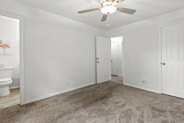 30078 E 143rd St S, Coweta, OK 74429 - unfurnished bedroom with carpet floors, ensuite bathroom, and a ceiling fan