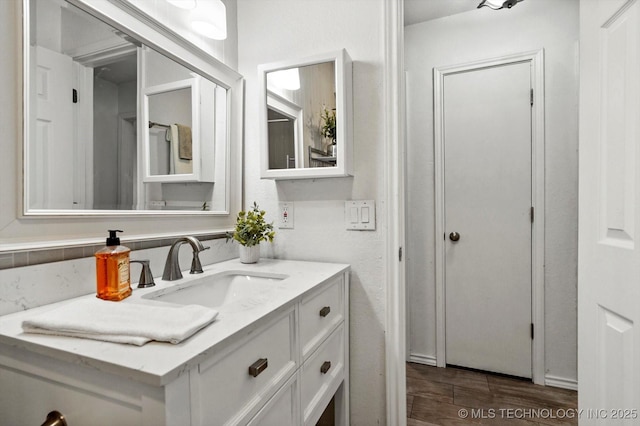 30078 E 143rd St S, Coweta, OK 74429 - bathroom featuring vanity and wood finished floors
