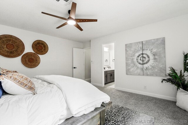 2012 N Santa Fe Ave, Tulsa, OK 74127 - bedroom featuring light colored carpet, ensuite bath, and a ceiling fan