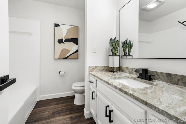 2012 N Santa Fe Ave, Tulsa, OK 74127 - bathroom with vanity, wood finished floors, and bathtub / shower combination