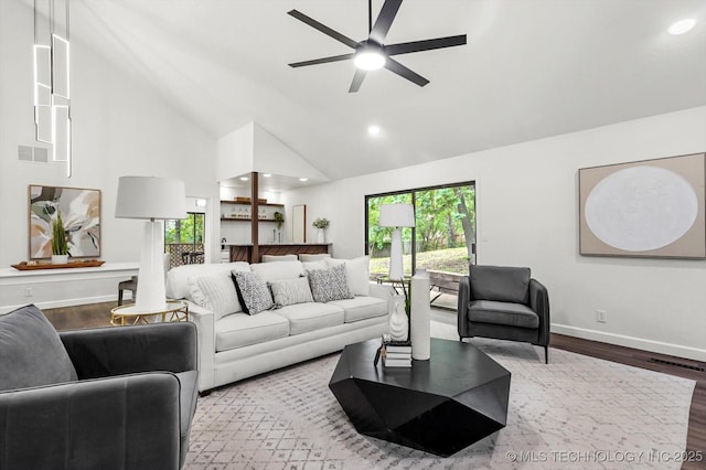 2012 N Santa Fe Ave, Tulsa, OK 74127 - living area with a ceiling fan, wood finished floors, plenty of natural light, recessed lighting, and high vaulted ceiling