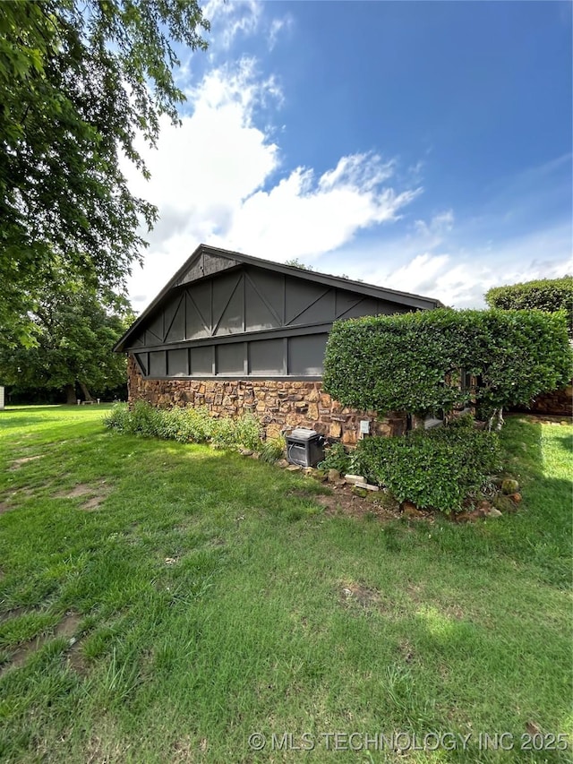 23536 Timber Trl W, Bristow, OK 74010 - view of side of property featuring a yard and stone siding