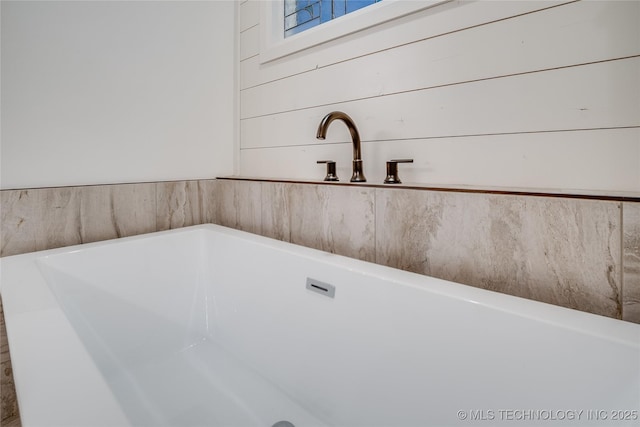 6904 E 86th Pl N, Owasso, OK 74055 - bathroom featuring a freestanding bath