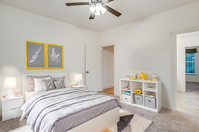 6904 E 86th Pl N, Owasso, OK 74055 - bedroom with light colored carpet and ceiling fan
