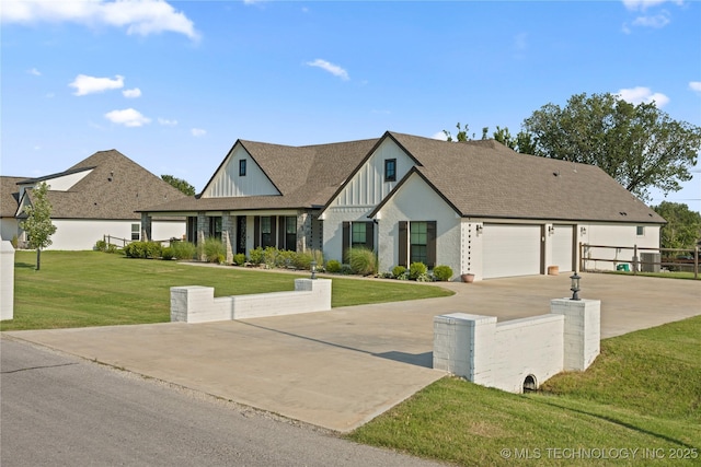 6904 E 86th Pl N, Owasso, OK 74055 - tudor home featuring board and batten siding, driveway, a front yard, roof with shingles, and an attached garage