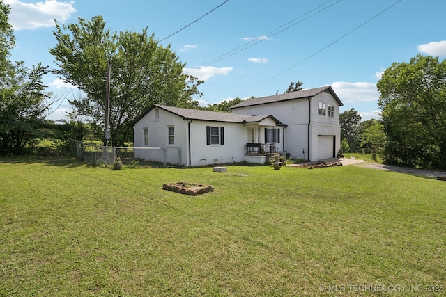 36516 Cramer Rd N, Mannford, OK 74044 - rear view of house with a garage and driveway