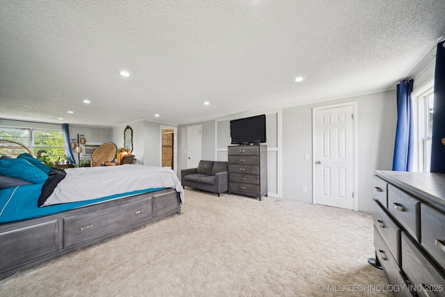 36516 Cramer Rd N, Mannford, OK 74044 - bedroom with a textured ceiling, recessed lighting, and carpet