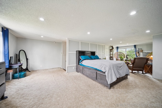 36516 Cramer Rd N, Mannford, OK 74044 - bedroom with a textured ceiling, carpet flooring, and recessed lighting