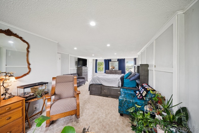 36516 Cramer Rd N, Mannford, OK 74044 - bedroom with carpet flooring, a textured ceiling, crown molding, recessed lighting, and a decorative wall