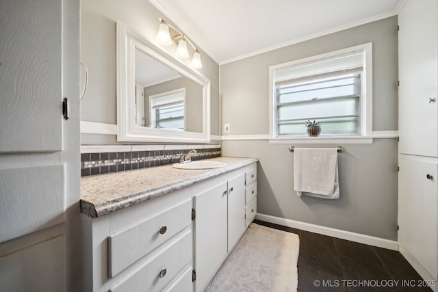 36516 Cramer Rd N, Mannford, OK 74044 - bathroom featuring plenty of natural light, vanity, ornamental molding, and backsplash