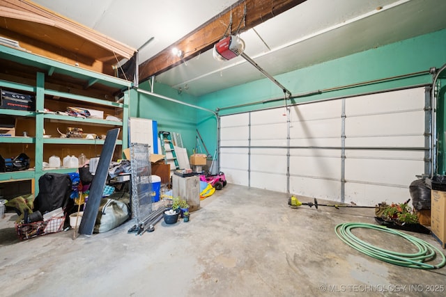 36516 Cramer Rd N, Mannford, OK 74044 - garage featuring a garage door opener