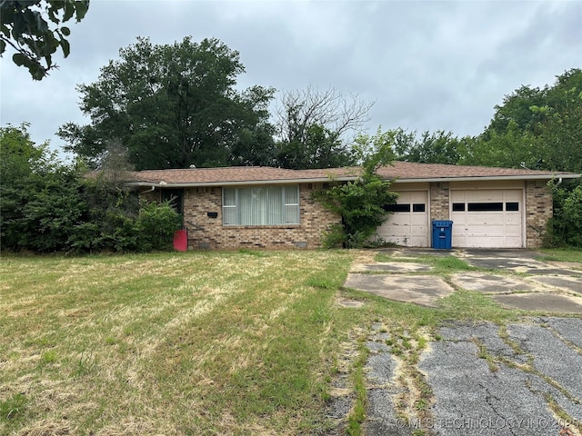 1581 S Velma, Atoka, OK 74525 - ranch-style home with brick siding, driveway, a garage, and a front yard