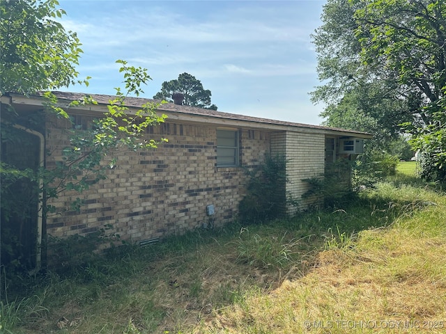 1581 S Velma, Atoka, OK 74525 - view of property exterior with brick siding