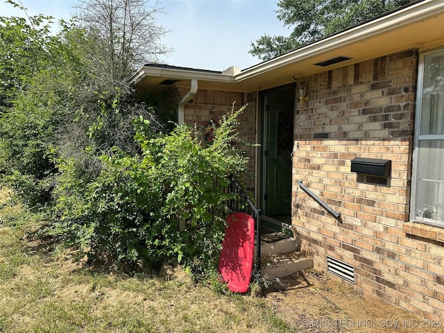 1581 S Velma, Atoka, OK 74525 - view of exterior entry featuring brick siding